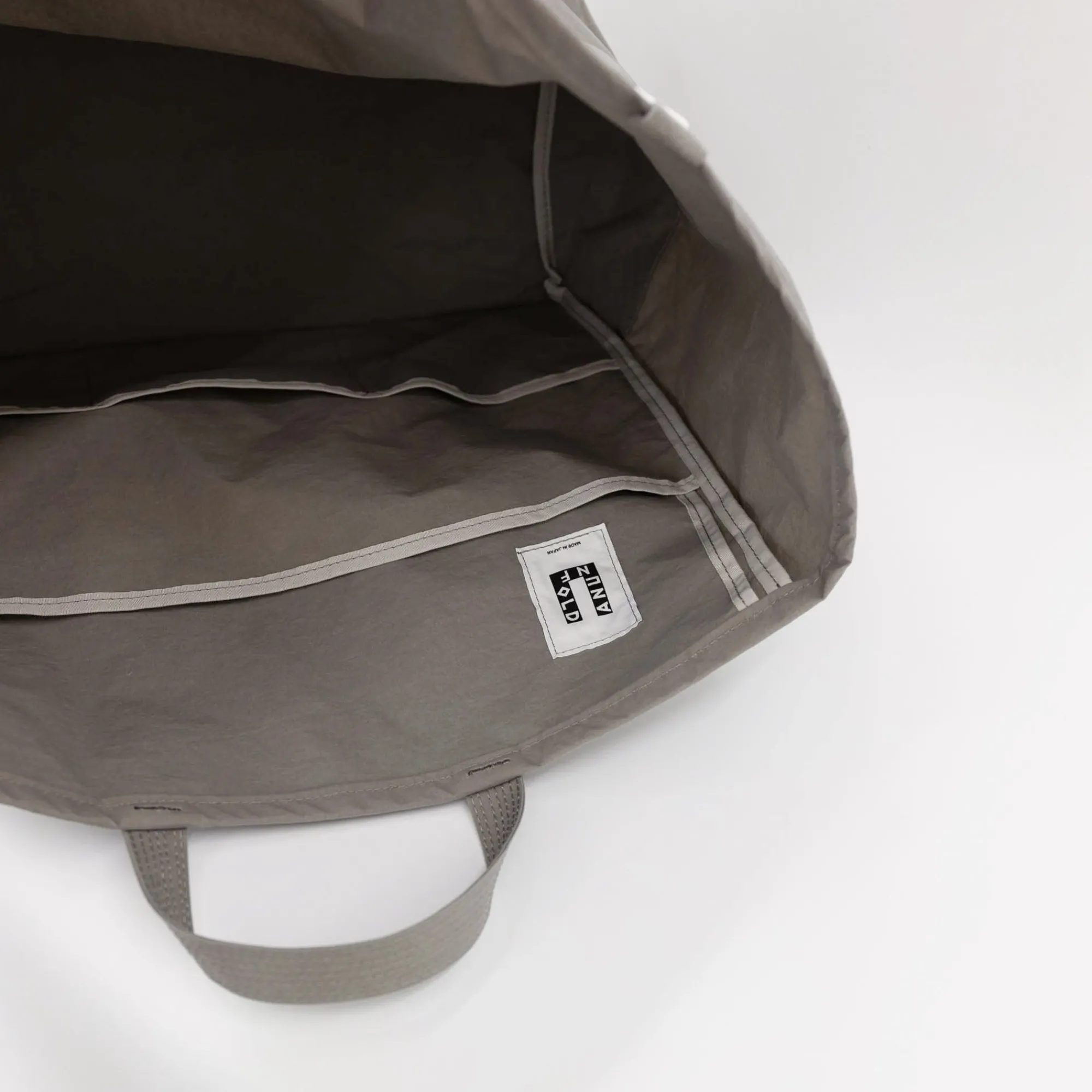 TORTOISE-yellow paper Anunfold Bags & Wallets*Anunfold Travel Tote - Gray